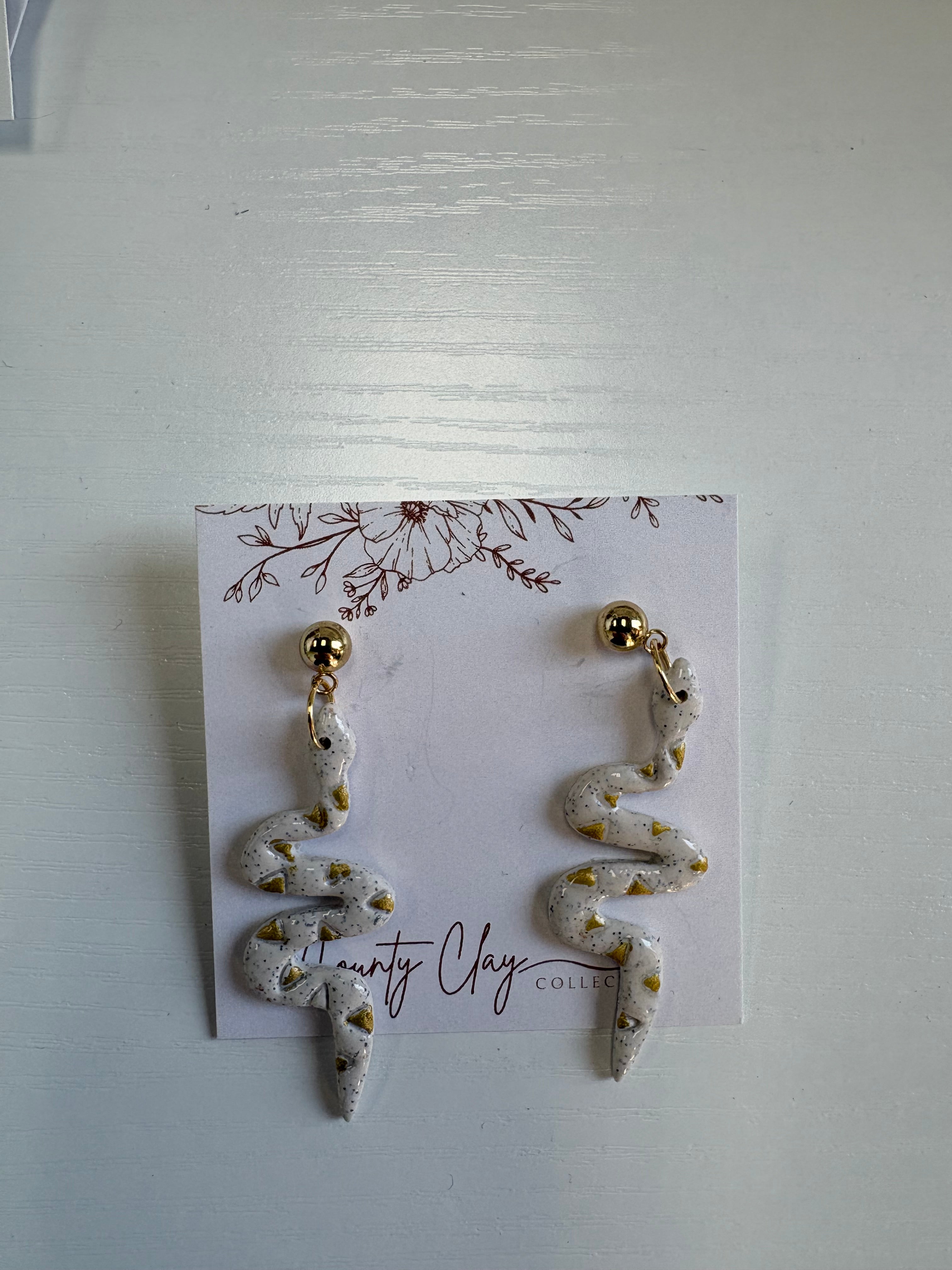 County Clay- serpent earrings